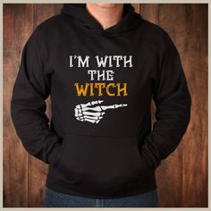 I'm with the witch halloween Hoodie, halloween couples hoodie, mens lazy custome, party custome A unisex heavy blend hooded sweatshirt is relaxation itself. The material is a thick blend of cotton and polyester. This makes for a plush, soft feel alongside warmth. It's also a great surface for printing. There are no side seams. A spacious kangaroo pocket hangs in front. The hood's drawstring is the same color as the base sweater.  .: 50% Cotton 50% Polyester .: Medium-heavy fabric (8.0 oz/yd² (271.25 g/m .: Classic fit .: Tear away label .: Runs true to size Fitted Casual Hoodie For Halloween, Casual Fitted Hoodie For Halloween, Halloween Cotton Hoodie Sweatshirt, Black Halloween Hoodie With Letter Print, Fitted Letter Print Hoodie For Fall, Halloween Long Sleeve Hoodie With Relaxed Fit, Halloween Hooded Hoodie With Letter Print, Funny Black Winter Sweatshirt, Halloween Hooded Sweatshirt With Letter Print