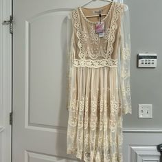 Brand New! Nude / Cream Embroidered Dress Size M Fits A Size 6 Beige Midi Dress With Lace Patchwork For Spring, Beige Lace Patchwork Midi Dress For Spring, Beige Lace Patchwork Dress For Spring, Spring Cream Long Sleeve Lace Dress, Cream Midi Lace Dress For Spring, Cream Lace Midi Dress For Spring, Spring Cream Lace Dress, Spring Cream Lace Dress For Brunch, Cream Lace Dress For Spring