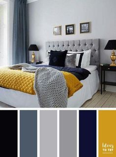 a bedroom with yellow and gray colors in the walls, along with pictures on the wall