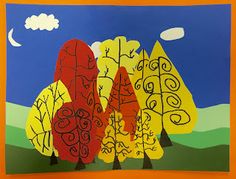 an art project with trees and clouds in the background, on a yellow paper board