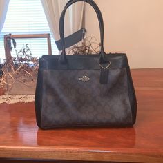 Nwt Authentic Signature Coach Casey Tote. Brown/Black. New In The Box. Never Used. Wallet To Match In Closet. Ships The Next Day!! No Tears Or Stains. Comes From A Smoke Free/ Animal Free Home. Feel Free To Ask Any Questions Or Make An Offer. Black Wallet With Detachable Strap For Daily Use, Black Workwear Bag With Interior Card Slots, Classic Black Wallet, Formal Black Shoulder Bag With Interior Card Slots, Formal Black Wallet With Detachable Strap, Classic Black Wallet For Work, Classic Black Wallet With Detachable Strap, Black Top Handle Satchel With Card Slots, Coach Business Bag With Interior Card Slots