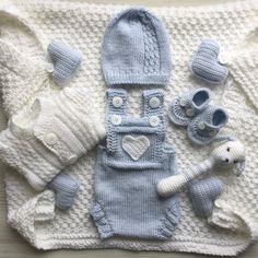 Knitting clothing set for baby boy. Sweater, romper, toy, hat, booties and blanket with for toys, little blue hearts, which hang on the button. Blanket size: 90/ centimeters or 35/35 inches. Can be as take home or baptism gift for newborn boy. A wonderfull shower gift for the expecting parents makes a really cute New Mom or New Dad gift. I need 8 days to prepare an order for shipping.Made in non-smoking and pet free home. Made with love for your babies.Pleas contact me for other size or color. New Born Baby Boy Dresses Ideas, Baby Boy Newborn Outfits Hospitals, Baby Boy Crochet Outfits, Take Home Outfit Boy, Button Blanket, Knitting Outfit, Crochet Baby Boy One Piece & Sets, Sweater Romper, Baptism Gifts For Boys