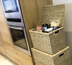 a kitchen with an oven and storage basket