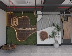 an office lobby with wood and artificial plants