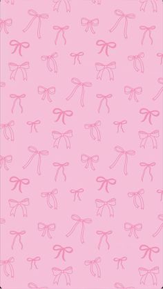 a pink background with bows on it