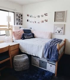 a small bedroom with a bed, desk and chair