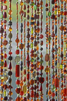 many beads are hanging from the ceiling