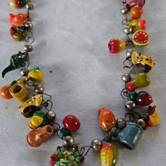 Harvest Celebration Necklace Handpainted Clusters Of Fruit Vegetable Animals Clay Pottery Pitchers Mugs. Original Piece. Handmade Multicolor Necklace Souvenir, Handmade Multicolor Jewelry Souvenir, Handmade Multicolor Jewelry As Souvenir, Whimsical Multicolor Dangle Necklaces, Whimsical Large Beads Jewelry Gift, Whimsical Multicolor Hand Painted Jewelry, Whimsical Jewelry With Large Beads For Gifts, Unique Multicolor Decorative Necklaces, Whimsical Multicolor Jewelry With Large Beads