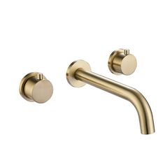 a gold faucet with two round handles