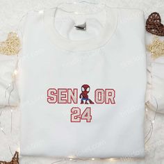 Senior Spider Man Embroidered T-shirt, Marvel Movie Embroidered T-shirt, Best Gift Ideas White Embroidered T-shirt For College, White Embroidered Graphics T-shirt For College, Casual T-shirt With Multicolor Embroidery And Logo, College School Spirit T-shirt With Custom Embroidery, College T-shirt With Custom Embroidery For School Spirit, College Embroidered Short Sleeve T-shirt, Embroidered Short Sleeve College T-shirt, Embroidered Short Sleeve T-shirt For College, White Custom Embroidered Top For College