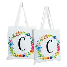 Keep these versatile initial monogrammed tote bags handy for different everyday errands or even for special gift-giving occasions. Our canvas tote bags feature a floral wreath design with 2 durable handles for easy carrying, as well as a unique non-woven construction. The bulk canvas tote bags are ideal for making custom favors for baby showers, bridal showers, bachelorette gifts, housewarming party gifts, and wedding decorations. Keep them in your car to go grocery shopping, or add fun ribbons Canvas Grocery Bag, Personalized Canvas Tote, Floral Wreath Design, Monogram Tote Bags, Personalized Canvas, Monogram Tote, Personalised Canvas, Bachelorette Gifts, Party Favor Bags