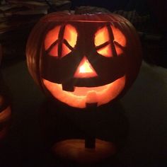 a carved pumpkin sitting on top of a table