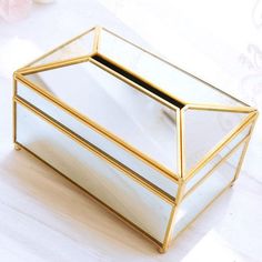 A Stylish & Practical Way To Store Your Tissues Clear Glass & Beautiful Gold Metal - This paper tissue box is made of sleek glass and premium metal, durable quality. The metal frame is carefully finished with beautiful gold color, clear glass design allows you to see all sides of your tissue, while the mirror reflects beautifully. Creative Design - Simple and modern style makes it looks more like a stylish home décor. It's not only a tissue holder in you home but also an elegant decoration for any place you wish to put it. Gorgeously display on the dresser, bathroom, table, and countertop. Product Specification: Material: Brass + Glass + Mirror Size: Medium - 19.5 x 12 x 11cm, Large - 23 x 12 x 11cm Tissue Box Crafts, Art Pierre, Tissue Case, Mirror Reflection, Tissue Holder, Brass Glass, Stylish Home Decor, Gold Glass, Elegant Decor