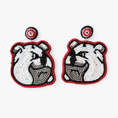 Express your team spirit with elegance and flair with our Beaded Bulldog Earrings. These stunning earrings feature a meticulously crafted bulldog design, made from high-quality beads that shimmer and catch the light beautifully. Perfect for Georgia Bulldogs fans, these earrings are available in classic team colors. Ideal for adding a touch of team spirit to any outfit, these Beaded Bulldog Earrings are both stylish and versatile. They make a great gift for any Bulldogs supporter or a perfect addition to your game day ensemble. Show your support with these unique and eye-catching earrings that celebrate your love for the Georgia Bulldogs! Free shipping and gift with purchase! Ships next business day. Handmade with love. Sale items are not returnable. Black Stud, Georgia Bulldogs, Christmas Delivery, Earring Sale, Stunning Earrings, Team Colors, 9 And 10, Free Gifts, Sale Items