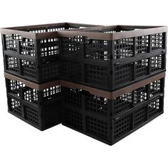 four black plastic crates stacked on top of each other with holes in the bottom and sides