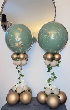 sage green, gold and white sand with greenery around. Jungle Balloon Centerpieces, Classy Balloon Centerpieces, Ballon Table Centerpiece Diy, Balloon Topiary Centerpieces, Elegant Balloon Centerpieces, Table Top Balloon Centerpieces, Engagement Party Centerpieces, Balloon Centrepiece, Balloon Topiary