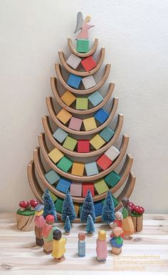 a christmas tree made out of wooden blocks