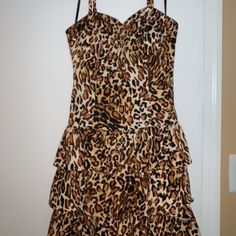 Leopard Print, Mini Dress With Tiered Ruffle Bottom, Spaghetti Straps, Sweetheart Neckline And Wired Bust. Size: 6 (Fits Like A Size Small) Never Worn But Do Not Have The Tags Materials: Shell Is 97% Cotton, 3% Spandex; Liner Is 100% Polyester Fitted Tiered Brown Dress, Fitted Brown Tiered Dress, Brown Sleeveless Mini Dress With Ruffles, Sleeveless Brown Mini Dress With Ruffles, Summer Leopard Print Dress With Ruffles, Summer Leopard Print Dresses With Ruffles, Fitted Leopard Print Dresses With Ruffles, Leopard Print Mini Dress, Black Spaghetti Strap Dress