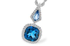 Add a pop of color to your jewelry collection with our London Blue Topaz Pendant! This unique piece features a stunning London blue topaz gemstone and is accentuated with sparkling diamonds. Made with high-quality white gold, it's truly a luxurious and stylish addition to any outfit. Fine Jewelry Blue Topaz With Pave Setting, Elegant Turquoise Jewelry With Brilliant Cut, Dazzling Blue Jewelry With Pave Setting, Elegant Blue Necklace With Pave Setting, Elegant Blue Necklaces With Pave Setting, Modern Blue Diamond Necklace, Diamond Fashion Jewelry, Blue Topaz Gemstone, Blue Topaz Pendant