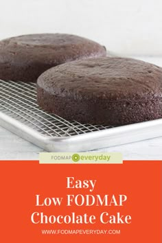 two chocolate cakes on a cooling rack with the words easy low fodmap chocolate cake