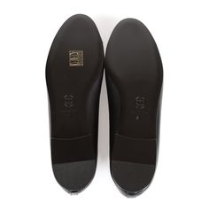 This pair of CC Ballet flats are in dark navy blue lambskin, with an embossed "CC" logo toe cap, tie front, tonal stitching, and black leather soles. Origin: ItalyCondition: New and never wornAccompanied by: Damaged Chanel box, Two shoe dustbagsSize: 37 EU Classic Ballet Flats With Leather Sole And Almond Toe, Classic Almond Toe Ballet Flats With Leather Sole, Classic Cap Toe Flats For Work, Classic Round Toe Ballet Flats For Business, Classic Flats With Leather Sole For Galas, Classic Black Flats With Textured Sole, Classic Leather Sole Ballet Flats For Business, Classic Ballet Flats With Leather Sole For Work, Classic Business Ballet Flats With Leather Sole