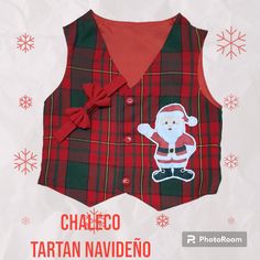 a red and black plaid vest with santa clause on it