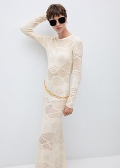 Knit long dress - Woman | MANGO USA Elegant Crochet Knit Maxi Dress, Knit Long Bodycon Dress, Knit Bodycon Long Dress, Long Knit Bodycon Dress, Chic Textured Knit Spring Dress, Elegant Long Sleeve Pointelle Knit Dress, Chic Long Sleeve Crochet Knit Dress, Chic Long Sleeve Crochet Evening Dress, Chic Long Sleeve Crochet Dress For Evening