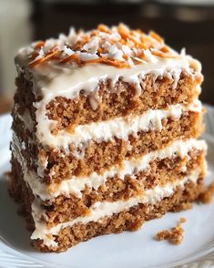 a piece of carrot cake on a white plate