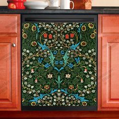 an ornately decorated dishwasher in a kitchen