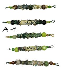 four different bracelets with the words happy, i love you written on each bead