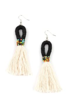 the black and white tasselled earrings are adorned with multi - colored beaded beads