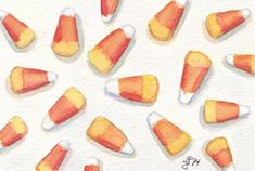 watercolor painting of candy corn on white paper