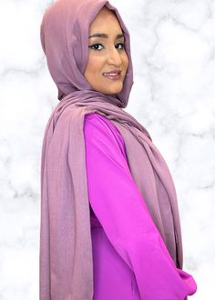 Elevate your modest fashion with Styled by Zubaidah's XL Cotton Modal Hijabs, where luxury meets versatility. These hijabs offer: Premium Comfort: A blend of soft, breathable cotton and modal fibers for year-round wear with a delightful modal texture. Over-sized for extra coverage! (75 x 35 in): Ample fabric for versatile draping options. Inclusive Options: Available in various colors and patterns to suit your style. Embrace comfort, style, and cultural inspiration in one elegant hijab. Solid Color Hijab For Eid, Eid Purple Hijab, Purple Hijab For Eid, Menlo Park Mall, Elegant Hijab, Hijab Pins, Pin Jewelry, Comfort Style, Skirt Pants