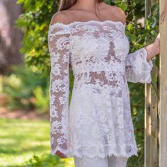 This Stunning Designer Off The Shoulder Lace Top Is Made Of The Finest European Stretch Lace. This Top Looks Great With The Coordinating Lace Pants Or With Skinny Jeans Or A Skirt. This Fit And Flare Top With Bell Sleeves Is Sophisticated, Fun And Romantic. The Top Is Sheer With Extra Lace Coverage At The Bust, However, You Can Wear An Off White Cami Underneath. The Top Can Sit On The Top Of The Shoulder Or Off The Shoulder. Ovlii's Lace Size 3. Can Fit 4-6 Color: Off- White Fitted Off-shoulder Top For Wedding, Fitted Lace Off-shoulder Blouse, Top With Bell Sleeves, Flare Top, Lace Pants, White Cami, Prom Dress Inspiration, Dress Inspiration, Stretch Lace