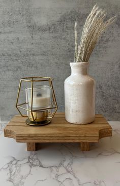 Add character and dimension to any space with this beautiful oak wood riser.  Perfect to display candles, plants, decor, soap, etc! It is sure to be a beautiful addition to any room in your home, adding charm and elevating your space.  Our wooden riser would make a perfect housewarming, hostess, Christmas, birthday, realtor or any special occasion gift.  Gift your loved ones a unique and handcrafted wooden riser to add character and function to any space. Each stand is handmade from start to finish with love in Texas.  Hand cut, sanded, stained and sealed with a protective matte finish. *Decor in pictures not included* DIMENSIONS:  L: 9 inches W: 5.5 inches H: 2 inches  NOTE: Because no two pieces of wood are the same, each stand is unique. Please allow for variation in the wood grain and Bathroom Decor Wood, Soap Plant, Wooden Riser, Soap Stand, Wooden Pedestal, Wood Riser, Wood Candle, Candle Displays, Soap Tray