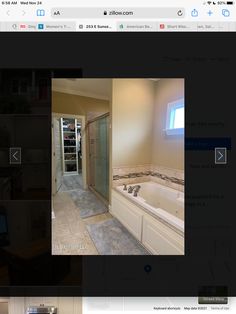 an image of a bathroom being viewed on the webpage for its owner's website