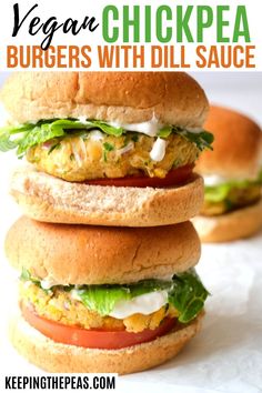 three burgers stacked on top of each other with the title vegan chickpea burgers with dill sauce