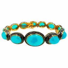 Luxury Turquoise Bracelets With 17 Jewels, Fine Jewelry Bracelet With Cabochon, Luxury Turquoise Bangle Bracelets, Elegant Round Turquoise Bracelet, Elegant Turquoise Round Bracelet, Elegant Turquoise Bracelets With Cabochon, Turquoise Round Cabochon Bracelets, Turquoise Cabochon Round Bracelets, Turquoise Cabochon Bracelet