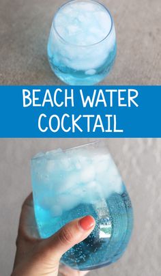 a hand holding a glass filled with blue liquid and the words beach water cocktail on it