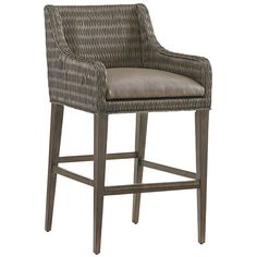 an upholstered bar stool with grey fabric