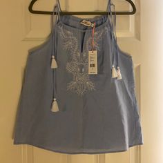 Nwt, Vineyard Vines, Easy Breezy Summer Sleeveless Light Blue Top With Double Tassels And White Scroll Embroidery On The Front! Spring Embroidered Camisole, Cotton Sleeveless Camisole With Floral Embroidery, Embroidered Sleeveless Camisole, Blue Sleeveless Embroidered Top For Summer, Light Blue Top, Sleeveless Tops Summer, Easy Breezy, White Embroidery, Blue Top