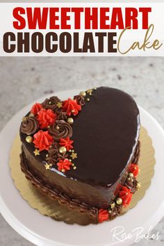 a heart shaped chocolate cake sitting on top of a white plate with the words, sweet heart chocolate cake