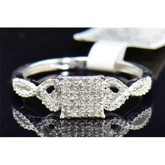 an image of a ring with diamonds on it