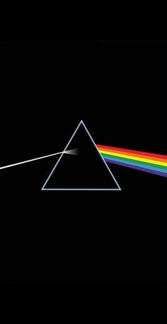 the dark side of the moon is shown with a rainbow light coming out of it