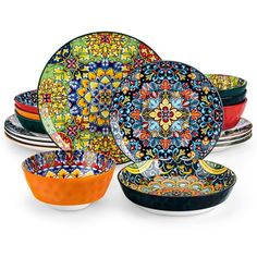 an assortment of colorful plates and bowls