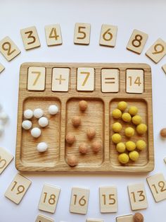 a wooden board with numbers and dices on it