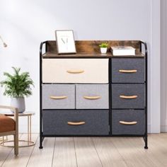 an image of a dresser with many drawers