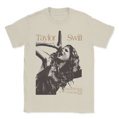 the taylor swift t - shirt is shown in black and white, with a woman holding a