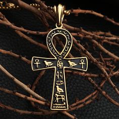 Introducing this Ancient Egypt Pendant in durable stainless steel, featuring an Ankh Cross in black and gold. Symbolic of life and eternity, this pendant pays homage to ancient Egyptian heritage with its striking and enduring design. Metals Type: Stainless Steel Pendants Type: slide We ship worldwide to 185 countries! Please allow 1-2 business weeks for your order to arrive. Black Symbolic Cross Pendant Necklace, Black Spiritual Jewelry With Antique Finish, Black Symbolic Cross Pendant Jewelry, Symbolic Black Cross Pendant Jewelry, Symbolic Black Brass Necklace, Symbolic Black Etched Jewelry, Black Brass Spiritual Jewelry, Black Ankh Metal Jewelry, Black Ankh Jewelry For Gifts