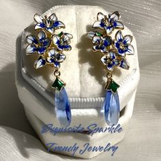 -Flowers Are White & Blue Painted Enamel With Blue Dangling Bead -Leverback Enclosure -Hypoallergenic Ear Posts Approximately A 3” Drop Goldtone (Gold Plated) Alloy Automatic 25% Discount And On Bundles Of 2 Or More Items From My Closet Or Make Your Own Bundle And Send Me An Offer. Bohemian,Chic,Elegant,Trendy,Sparkly,Stamped 925, 18k 14k Pink 10k Melting,Dripping,Anthropology,Anthro Halo, Round ,Brilliant Diamond, Oval, Emerald, Cushion, Princess, Radiant, Asscher, Pear, Marquise, Trillion.Uniq Hair Earrings, Cinderella Dress, Kendra Scott Earrings, Pink Cotton Candy, Layered Chains, Oval Earring, Beaded Drop Earrings, Bohemian Chic, Beaded Choker